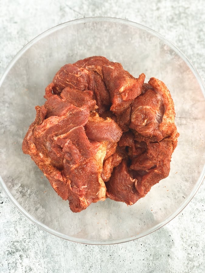 pork pieces covered in rub