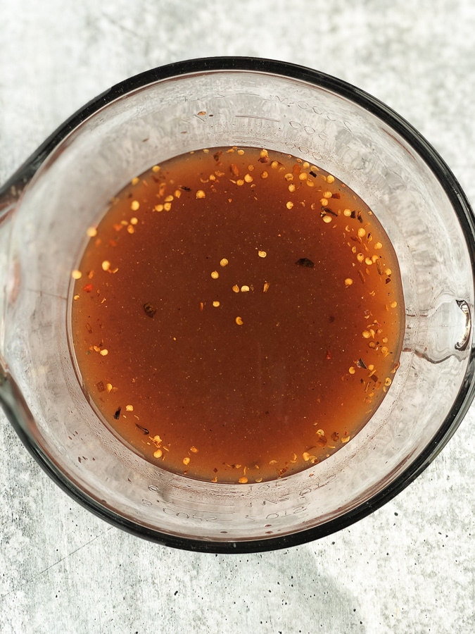 vinegar bbq sauce in glass