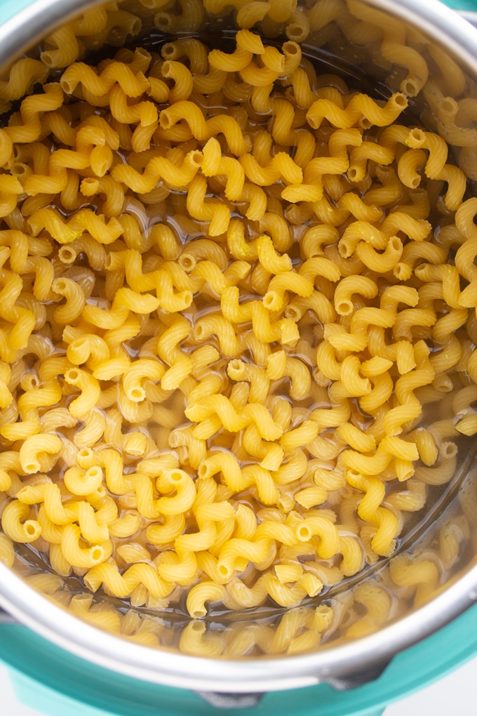 pasta in the pressure cooker insert with water