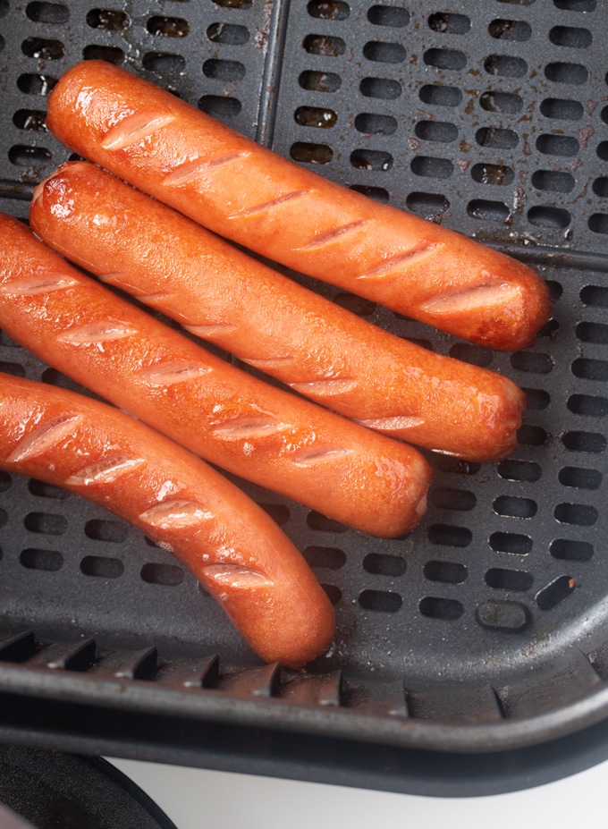 air fryer hot dogs cooked in air fryer basket