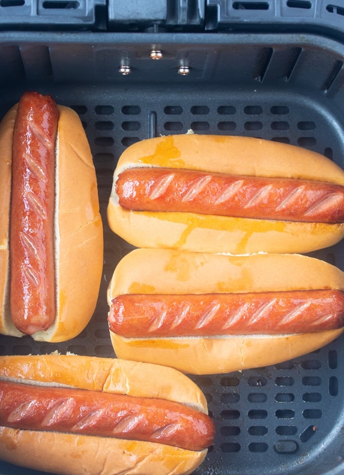 air fryer hot dogs in an air fryer basket