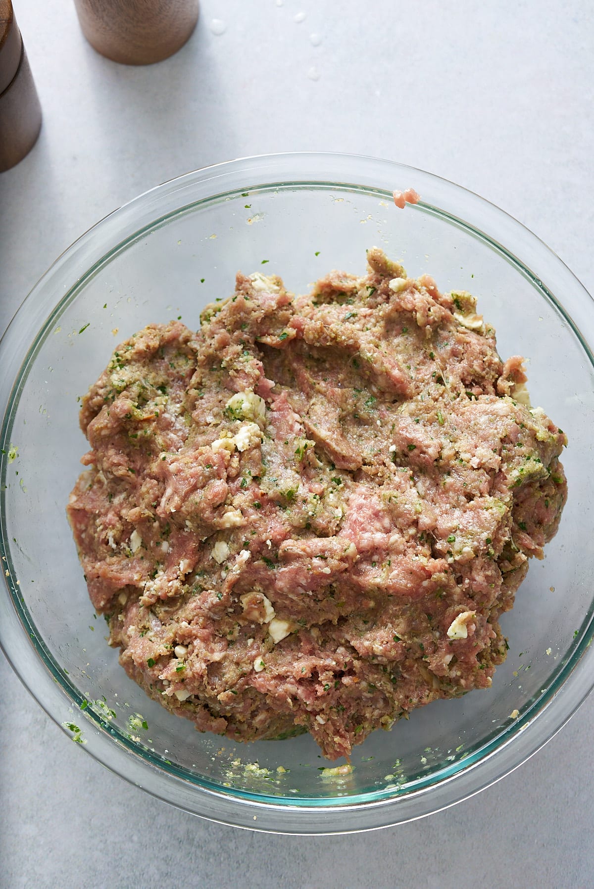 meatball mixture mixed in glass bowl