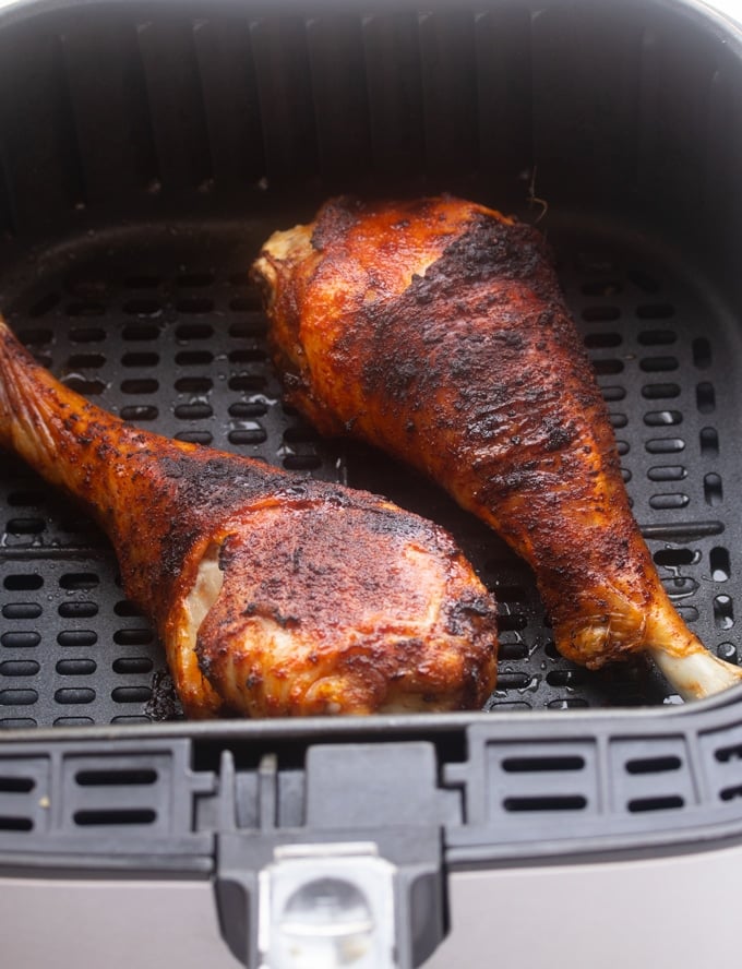 cooked air fryer turkey legs in air fryer basket