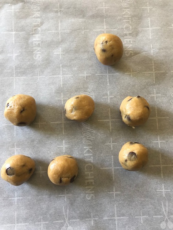 cookie dough rolled up into balls. 