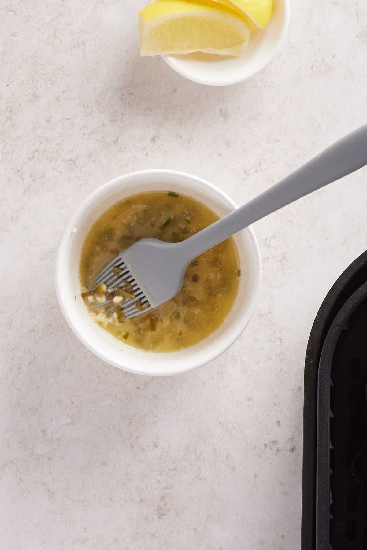 garlic butter melted in a glass jar