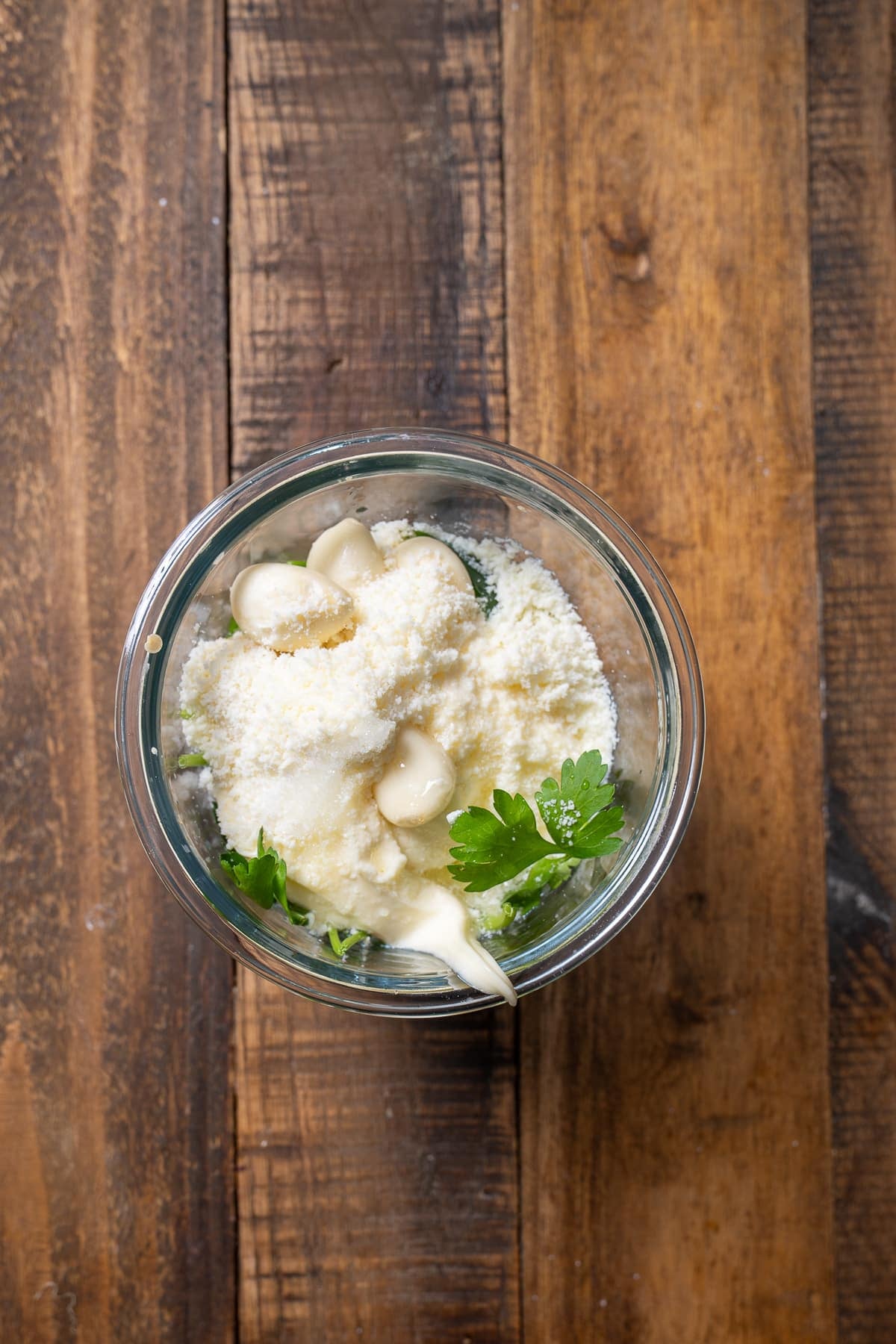 ingredients for green sauce in jar