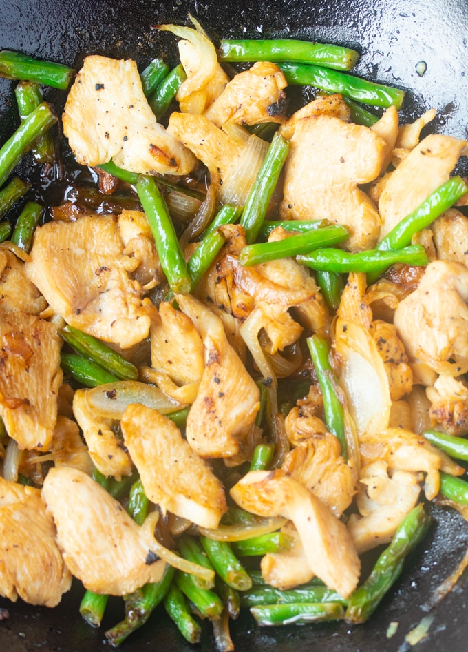 chicken and green beans in skillet