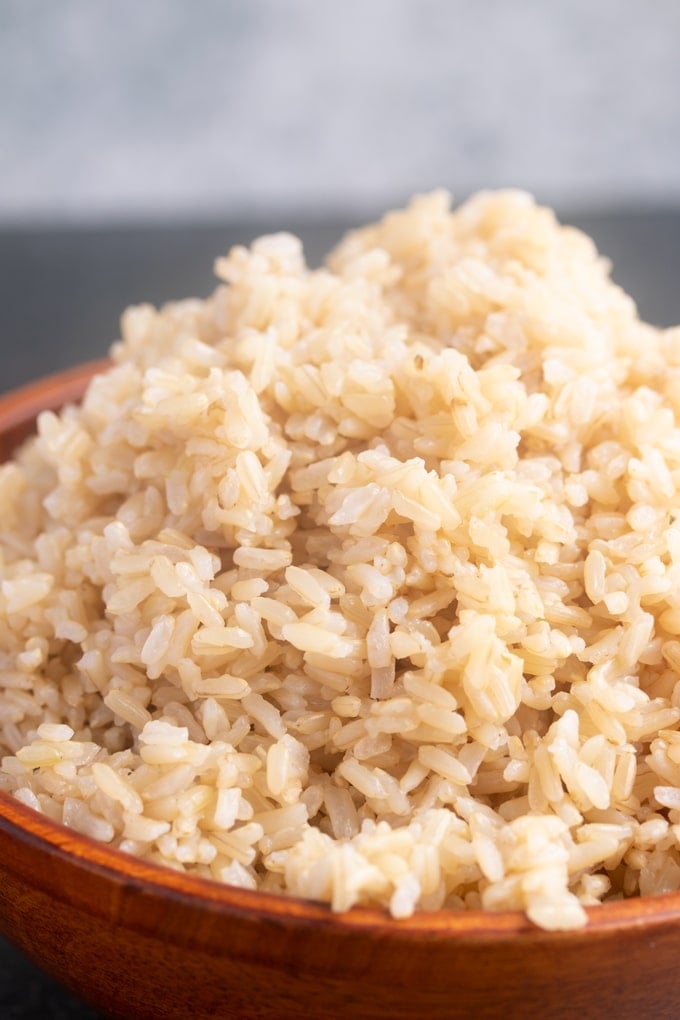 instant pot brown rice in a wooden bowl