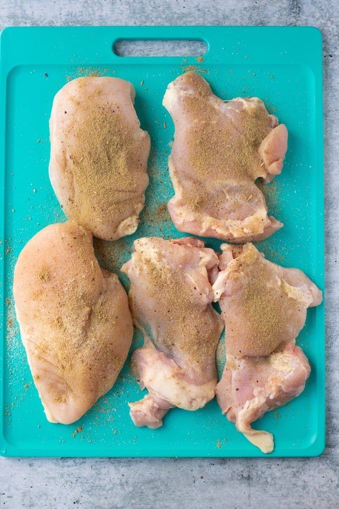 raw chicken on cutting board