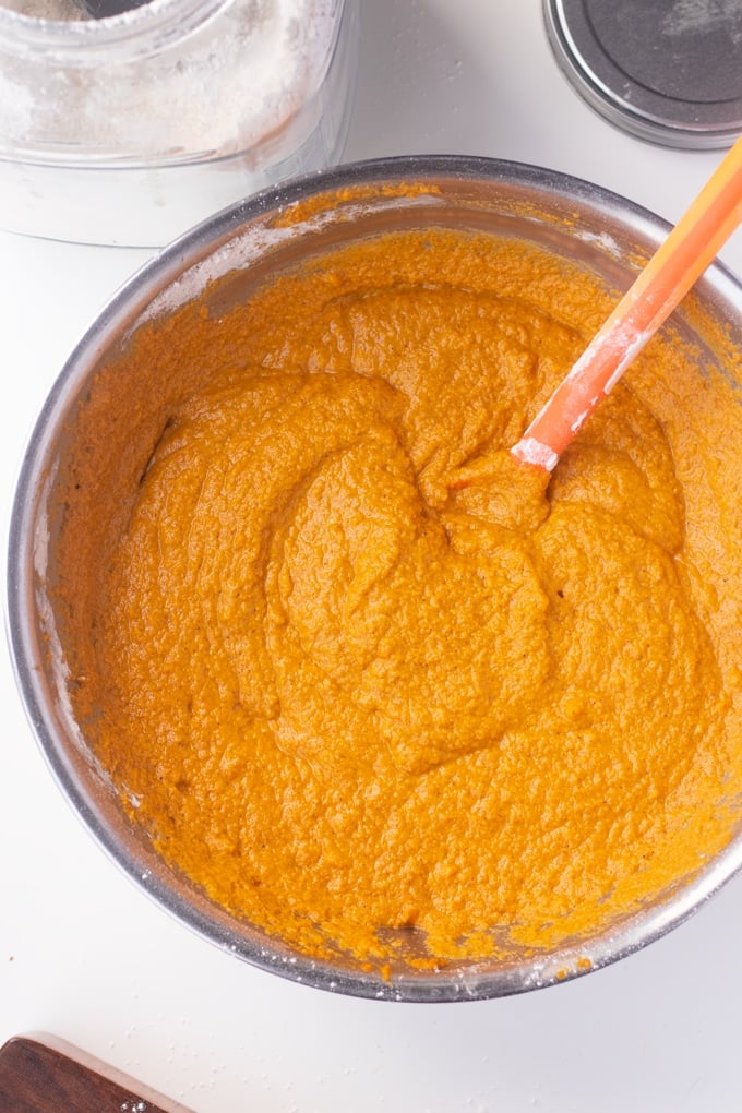 sweet potato puree in bowl sith spoon sticking out