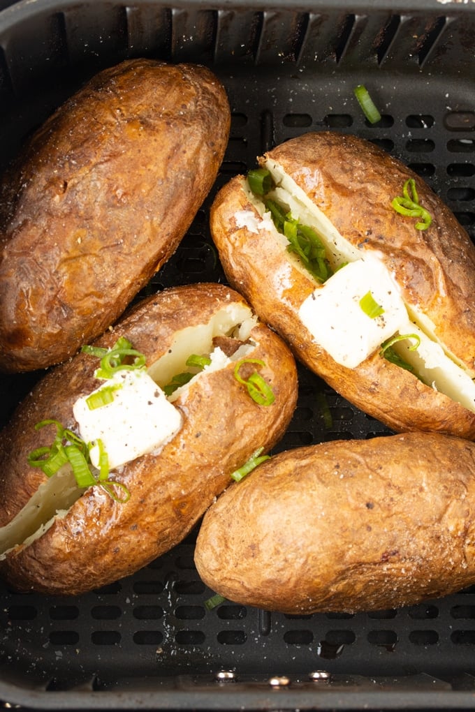 air fryer baked potatoes in air fryer basket