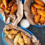chicken wings in blue baskets