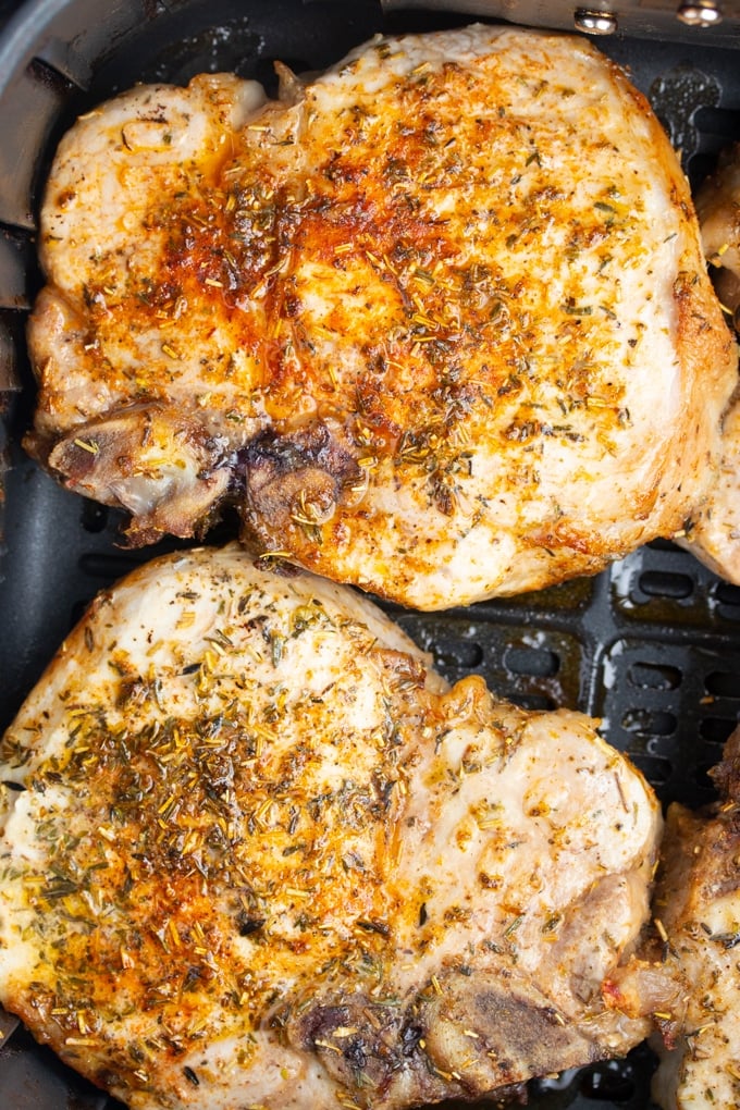 air fryer pork pork chops cooked in air fryer basket