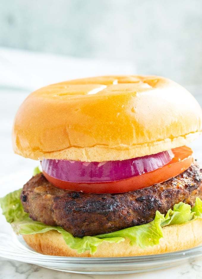 air fryer turkey burger with bun and lettuce and tomato