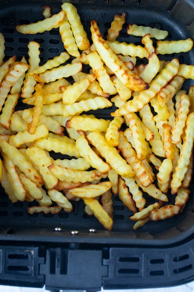 cooked french fries in basket