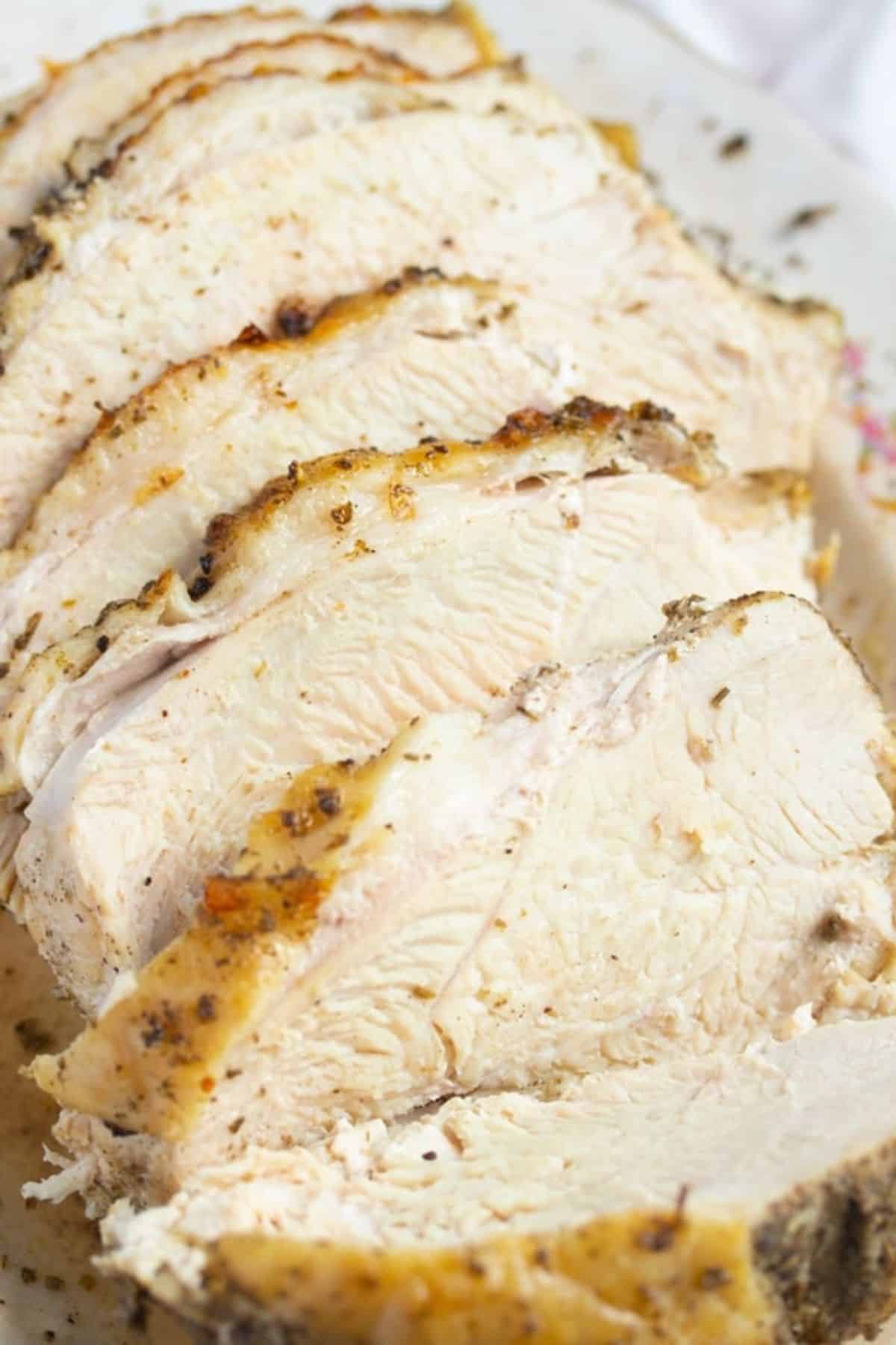 turkey breast sliced on white plate