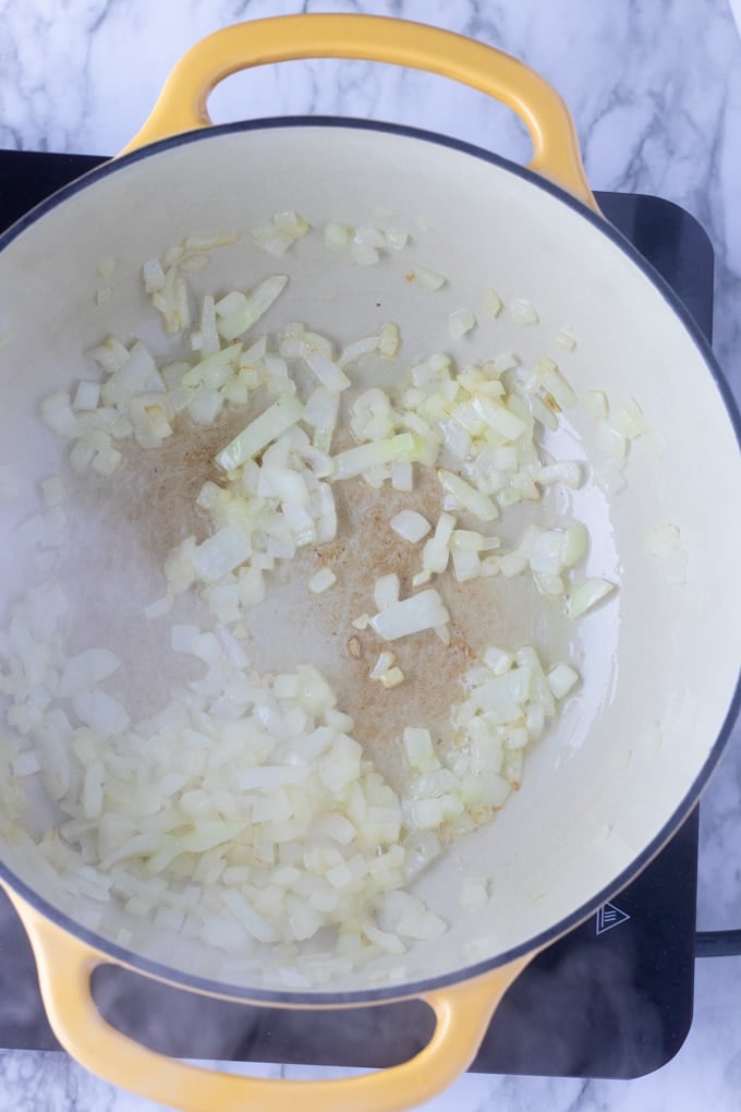 raw onions in a pan