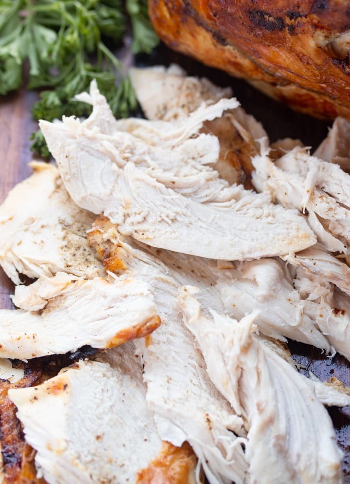 Sliced Air fryer Turkey breast on cutting board