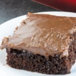 slice of cola cake on white plate