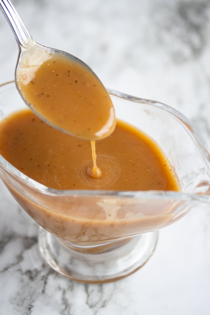 gravy being picked up with spoon