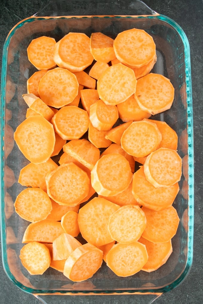 sliced sweet potatoes in 13x9 pan