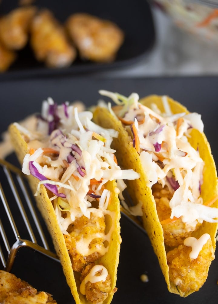 fried chicken tacos on a staco stand