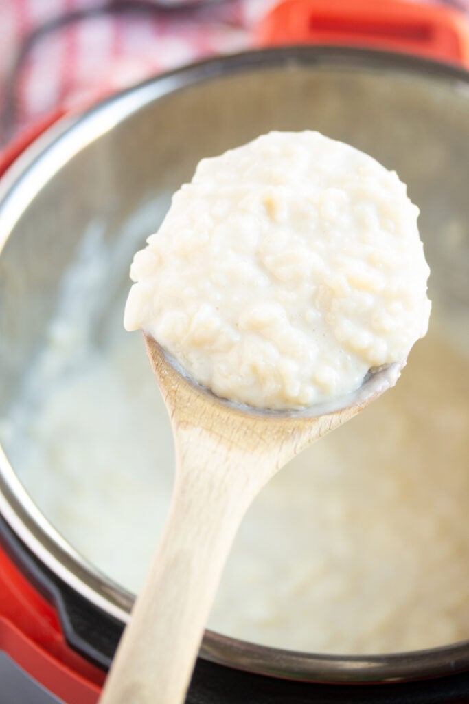 rice pudding on a wooden spoon