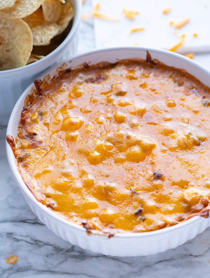 black eyed pea dip with melted cheese on top afer baking
