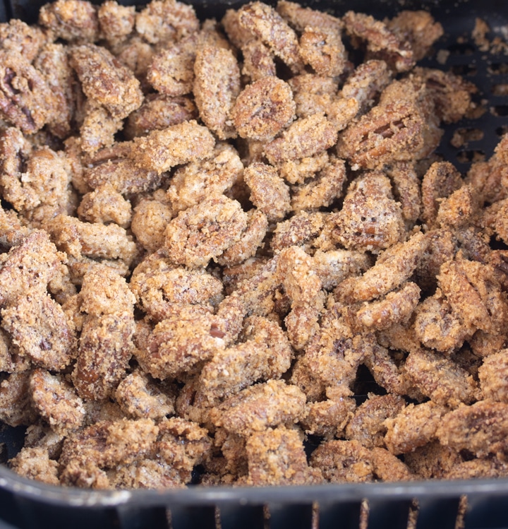 finished sugared pecans in air fryer basket