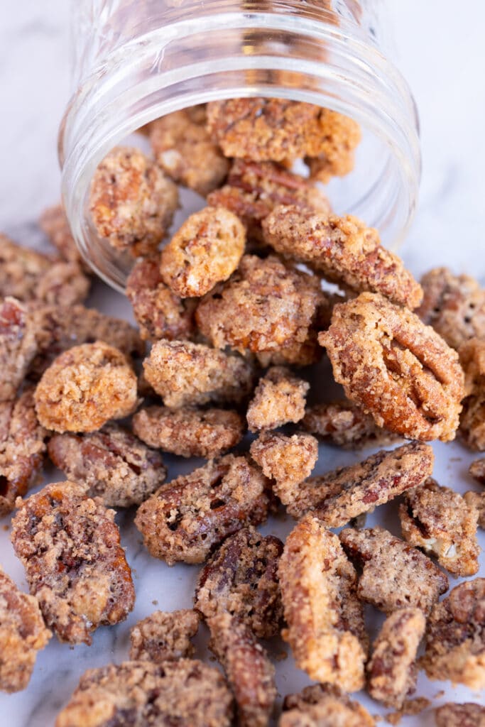 sugared pecans falling out of jar