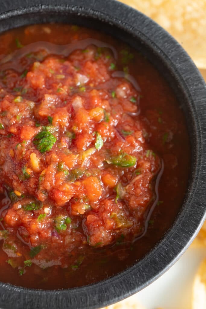 salsa in a black bowl 