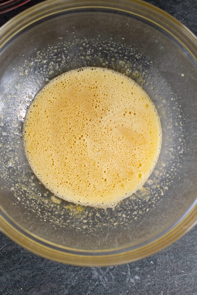 eggs and sugar in bowl after beaten