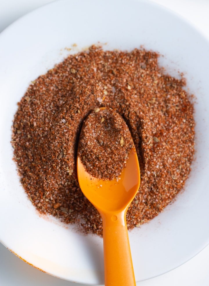 Taco seasoning with spoon sticking out of it