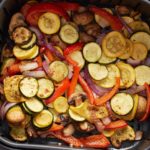 The cooked marinated vegetables in the air fryer basket