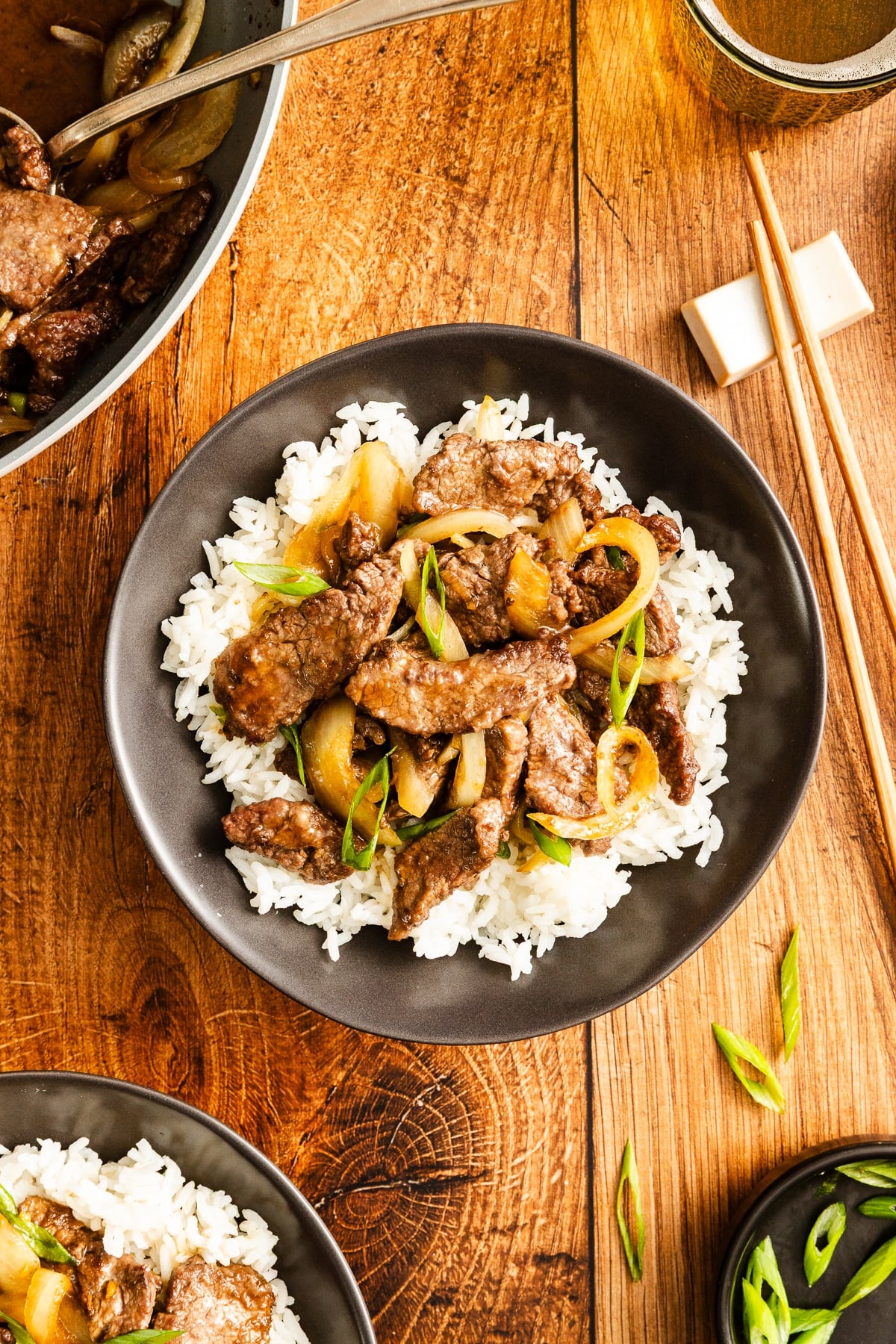 mongolian beef in bowl on top of white rice