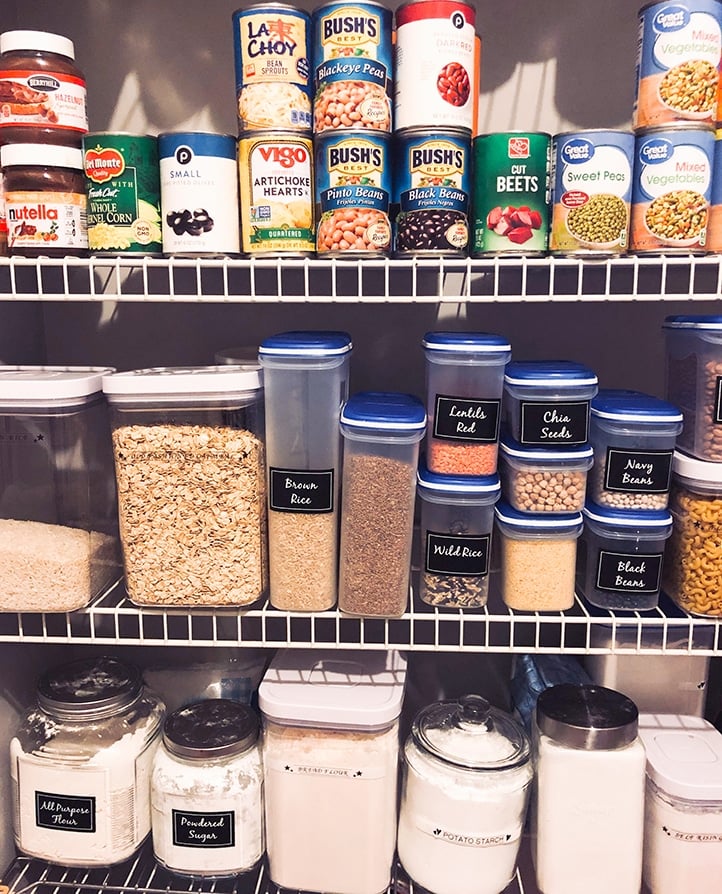 canned goods and other ingredients on shelves in a pantry