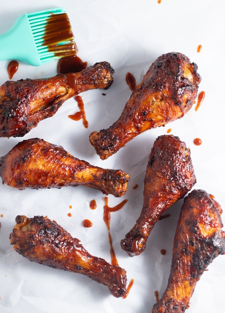 Sticky BBQ Air Fryer Chicken Legs on a white work top