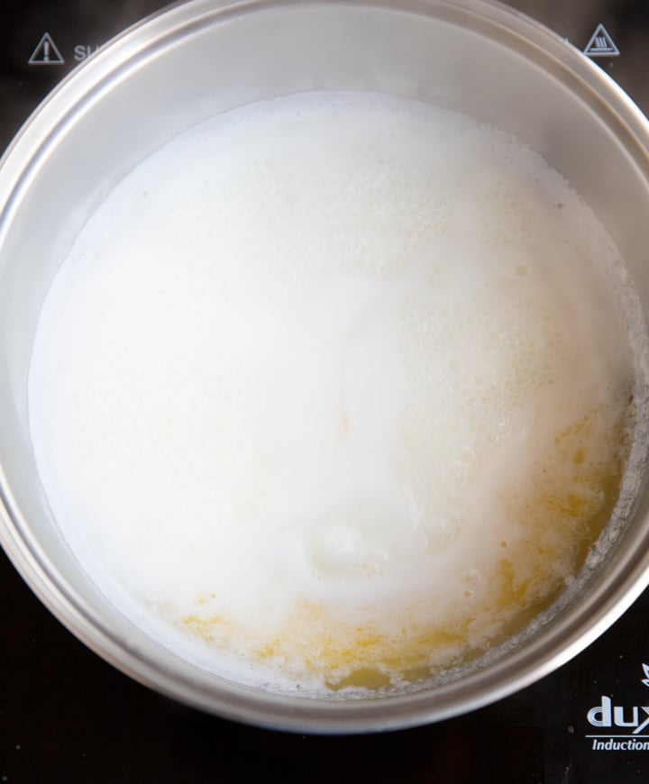 milk, butter, and water churro ingredients in saucepan