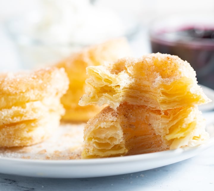 An air fryer donut cut in half