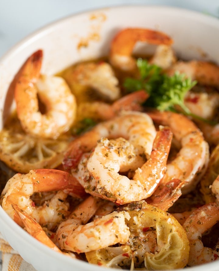 Air fryer lemon garlic shrimp garnished with fresh parsley