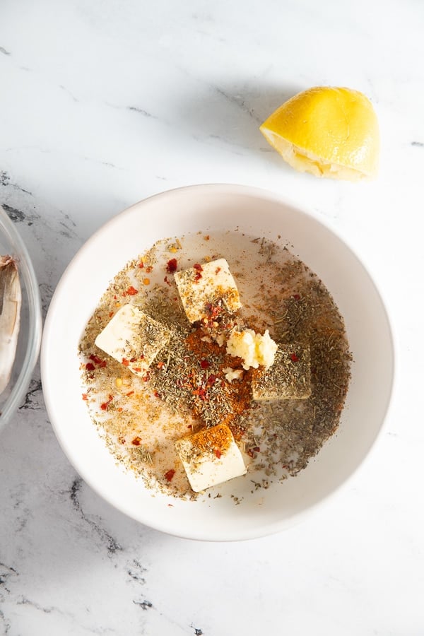 The seasonings and butter in a bowl