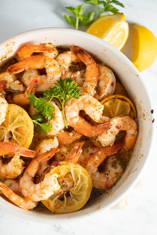 Air fryer lemon and garlic shrimp served in a white bowl