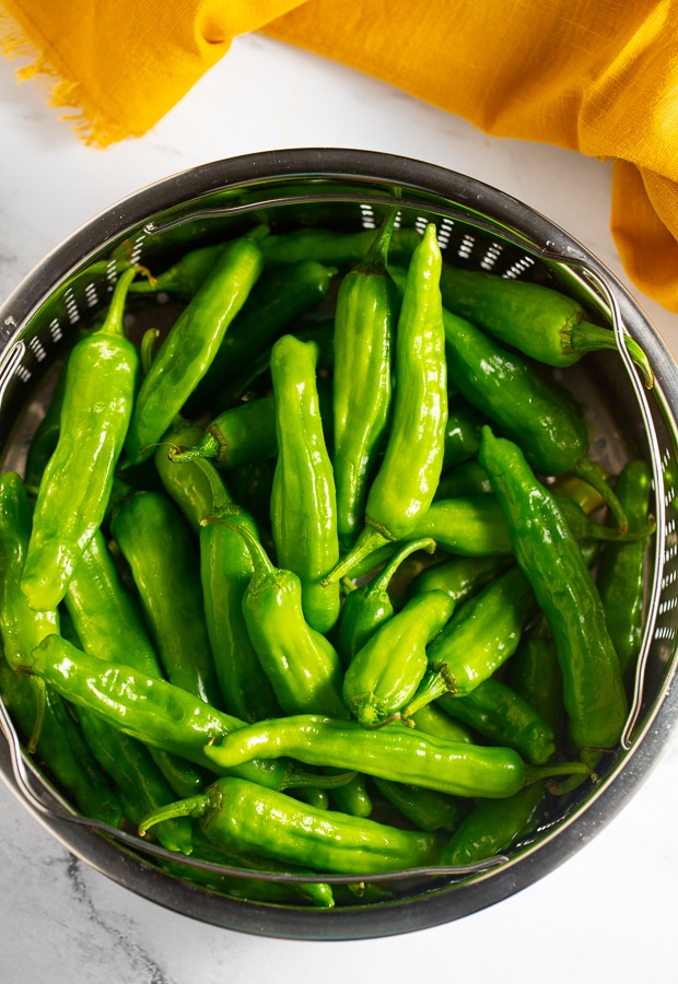 Raw peppers in a colander