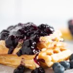 Blueberry compote served on top of waffles