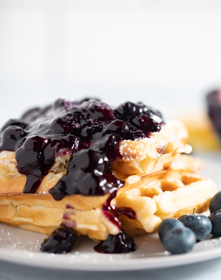 Blueberry compote served on top of waffles