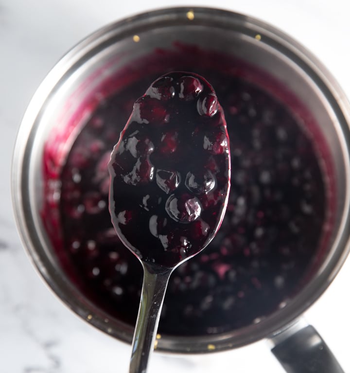 Blueberry compote on a spoon