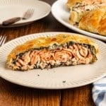 close up photo of cut salmon wellington
