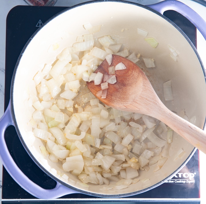 Softening the onions in a dutch oven