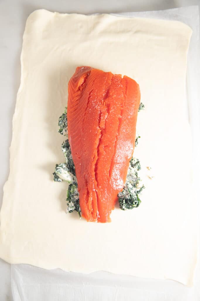 Salmon laid on top of the cream cheese mixture