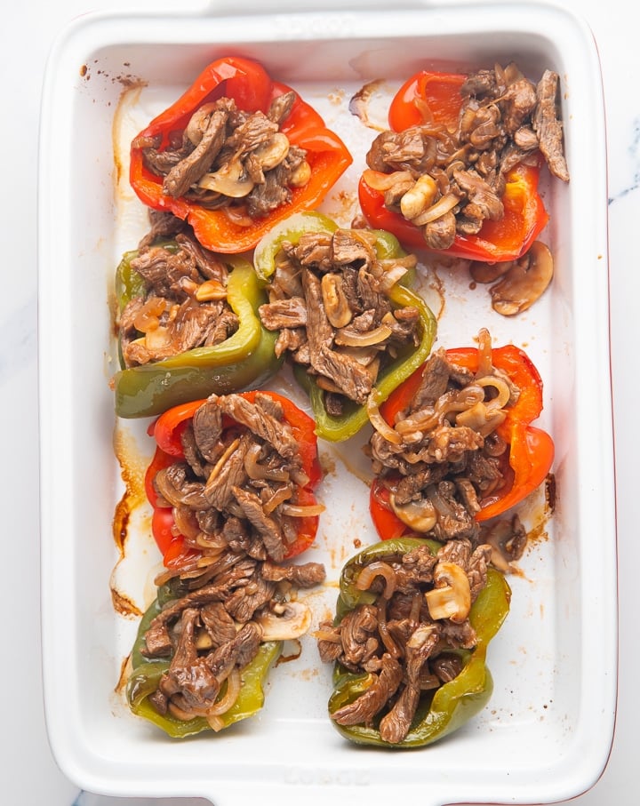 The cheesesteak filling in the pepper halves